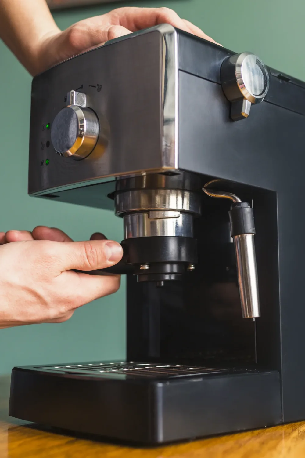 hands-installing-filter-into-coffee-maker